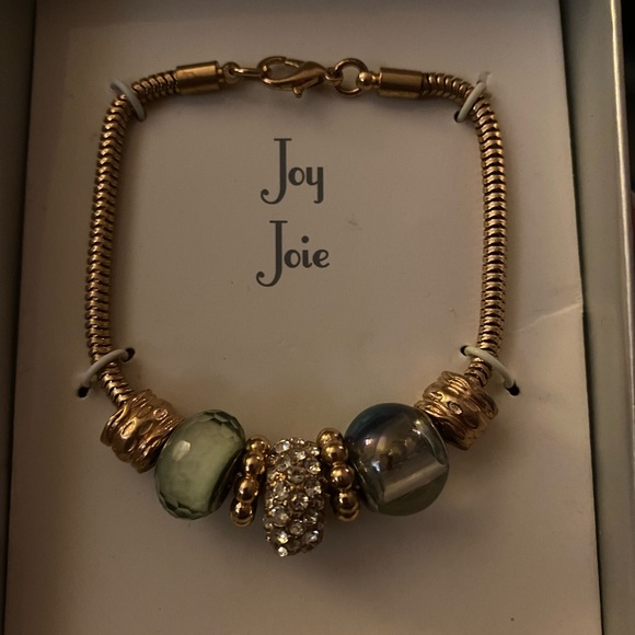 Gold colour metal bracelet with charms. - Picture 2 of 2